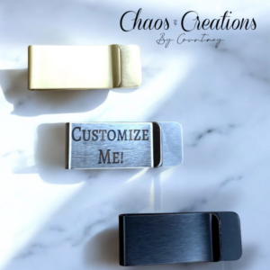 Custom engraved stainless steel money clips in gold, silver, and black displayed together