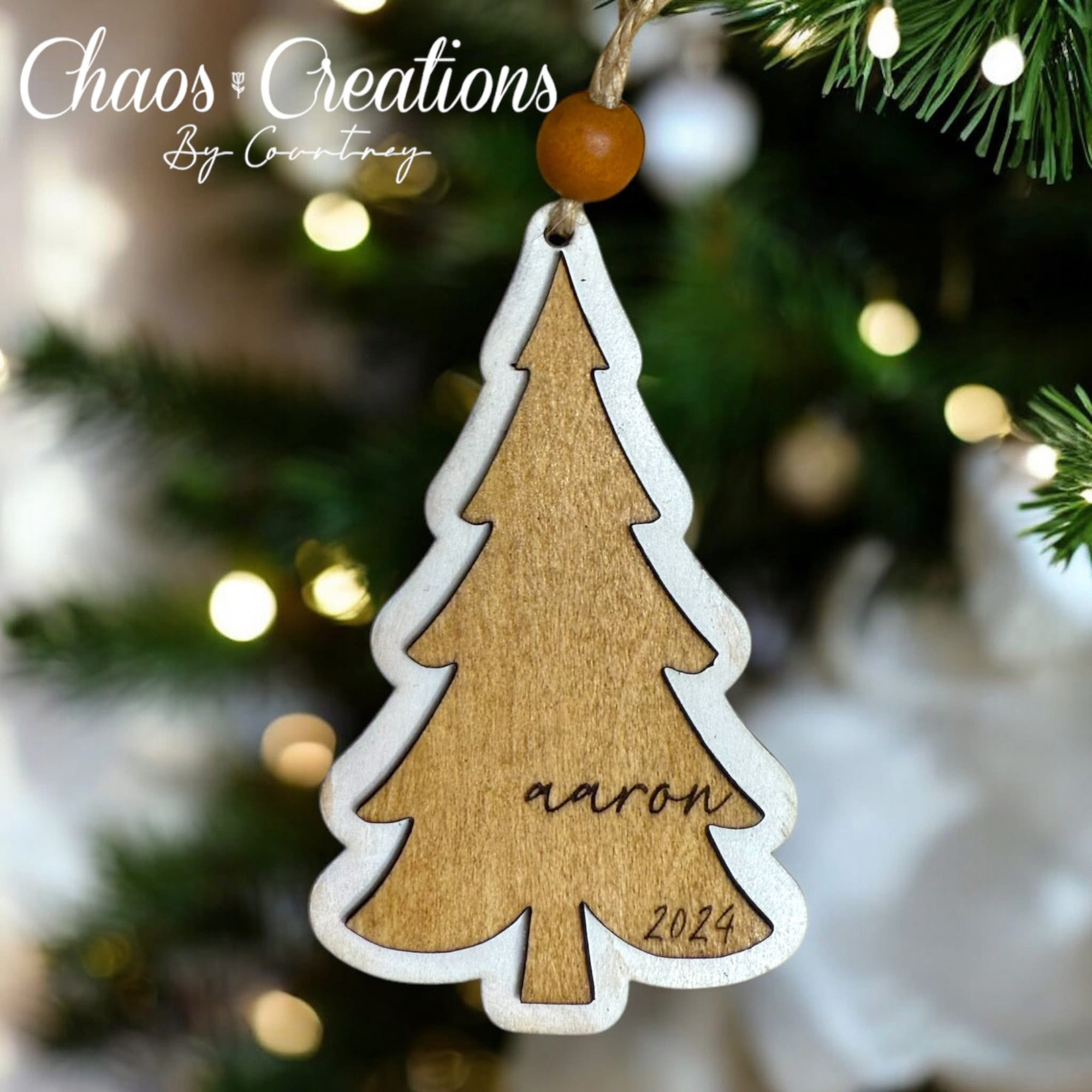 Personalized laser cut name ornament custom made for Christmas trees, holiday gifts, and family keepsakes.